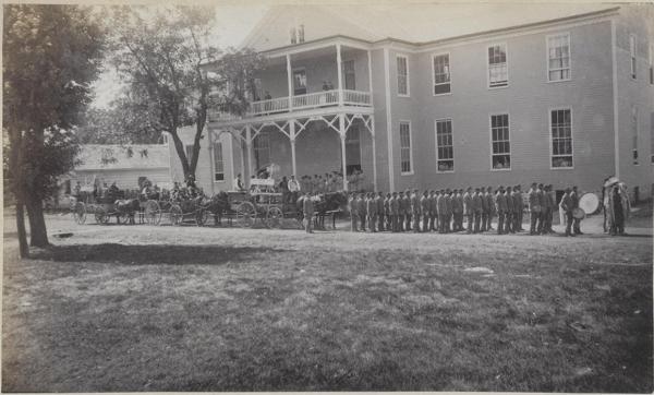 Parade of students in front of dining hall, c.1885