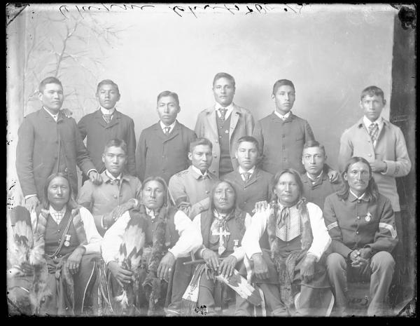Five visiting chiefs with ten male students, c.1885