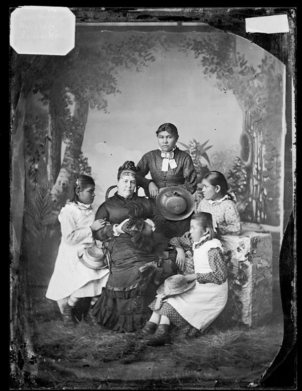 Mary Ealy, Nellie Carey, Mary Perry, and Jennie Hammaker with teacher Mary Hyde [version 1], c.1881