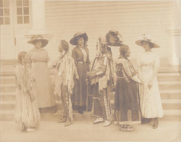 Jeanette Pappin, Clemence Le Traille and Blanche Jollie with Blackfeet Indian Visitors [version 1], 1913