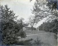 Central Campus Seen Through Trees, c. 1909