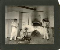 Male Students Removing Bread From Oven, 1901