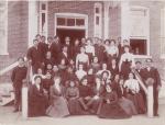 Large Group of Male and Female Students on the Steps of a Building, c. 1900