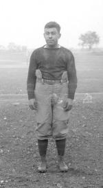 Joseph Bergie posed on a field, c.1911