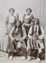 Two chiefs with two female students, c.1897