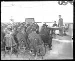 Male students at a debating society meeting, c.1885