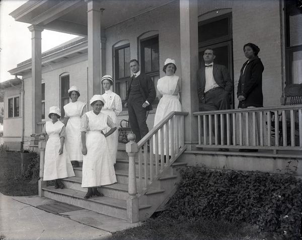 Staff Posed on Steps of New Hospital, c. 1908