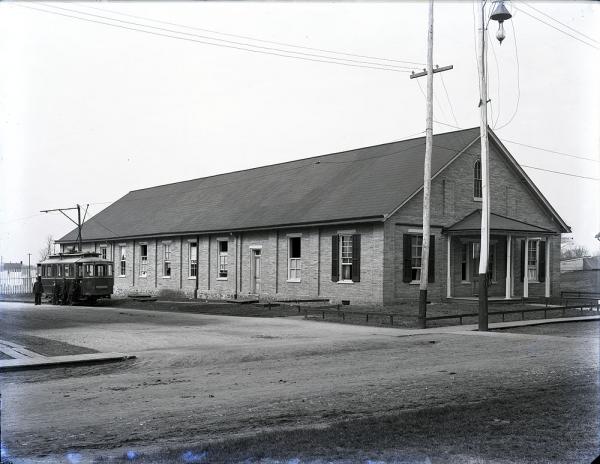 Laundry Building with Trolley Parked Alongside, c. 1900