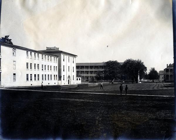 Central Campus with Students Playing Tennis, c. 1909