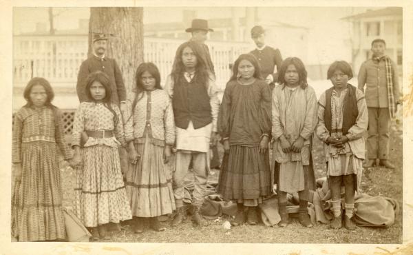 Seven Chiricahua students upon arrival, 1886
