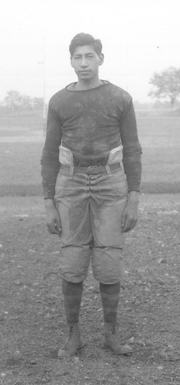 Bruce Goesback in football uniform, c.1911