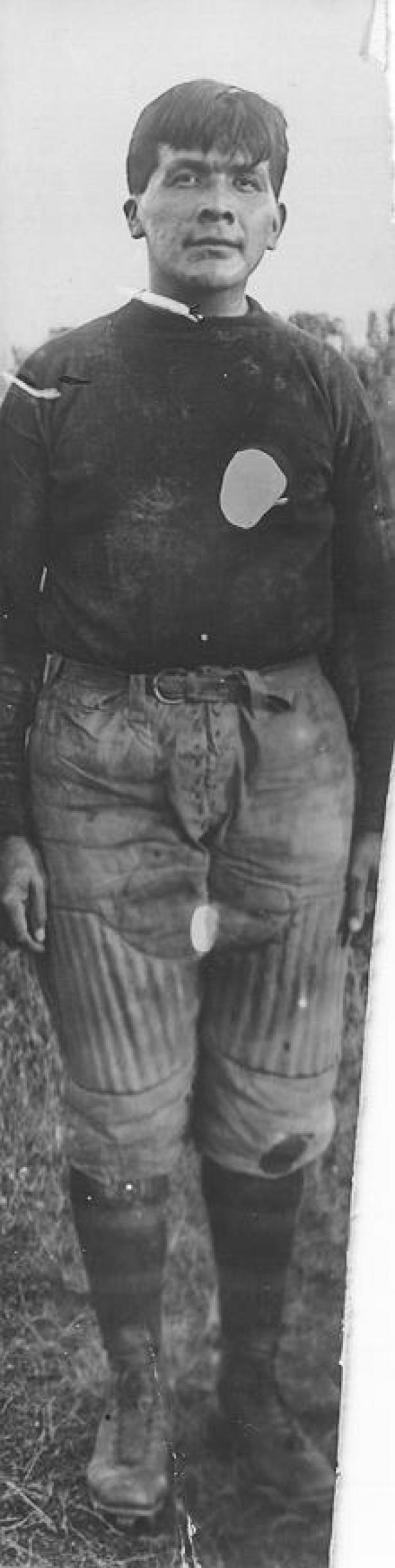 Elmer Busch in football uniform, c.1912