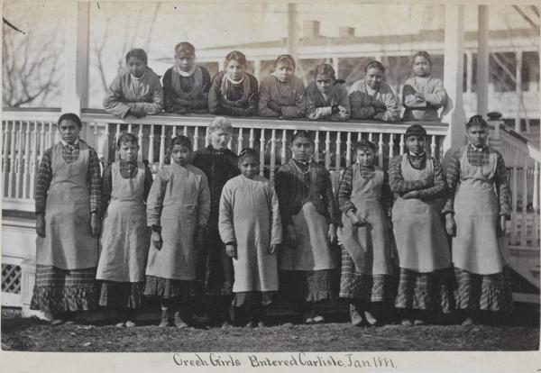 Fifteen female Creek students with teacher, 1881