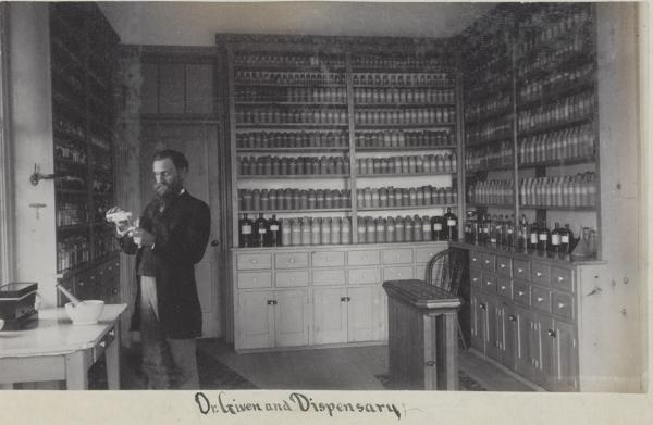 Dr. Given in the dispensary, c.1887