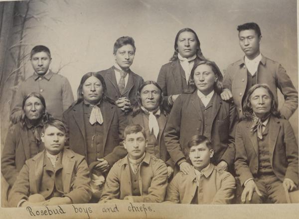 Six Sioux chiefs with six male students [version 2], c.1890