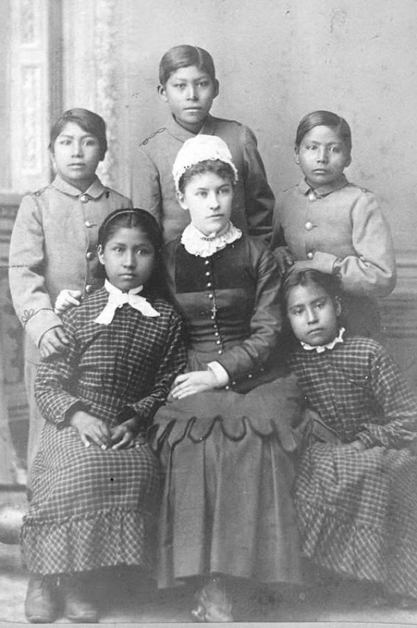 Five students with teacher Miss Spencer, c.1880
