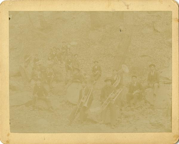 Band Members with Instruments on Hill, 1895