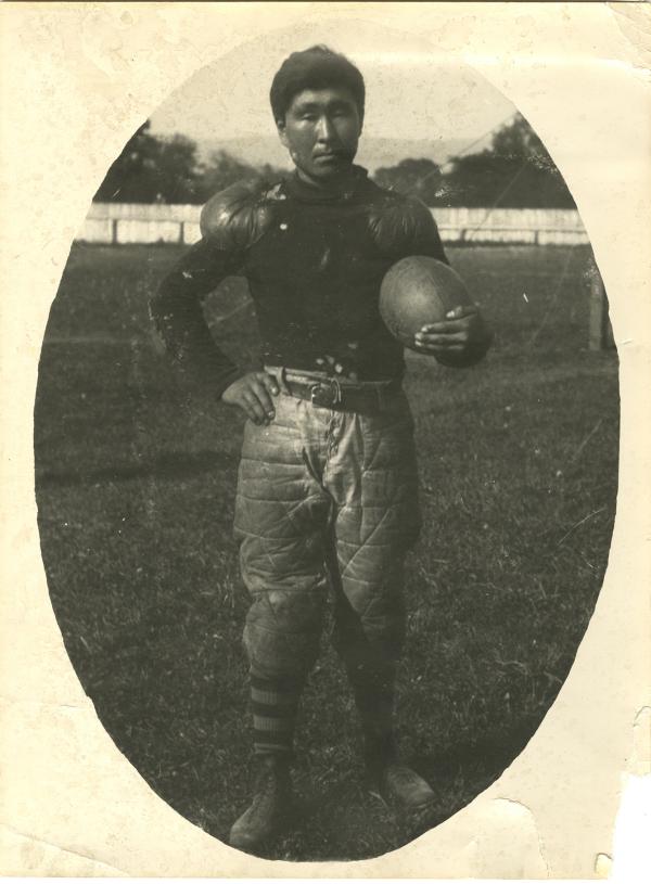 Nikefer Shoushick in football uniform, 1902