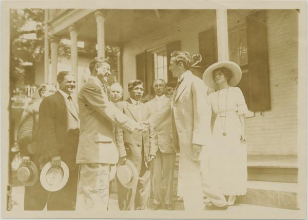 Jim Thorpe shaking hands, c.1912