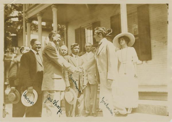 Jim Thorpe and shaking hands with Moses Friedman, c.1912