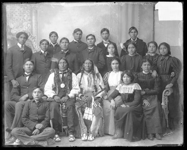 Two Cheyenne chiefs with a large group of students [version 1], c.1891