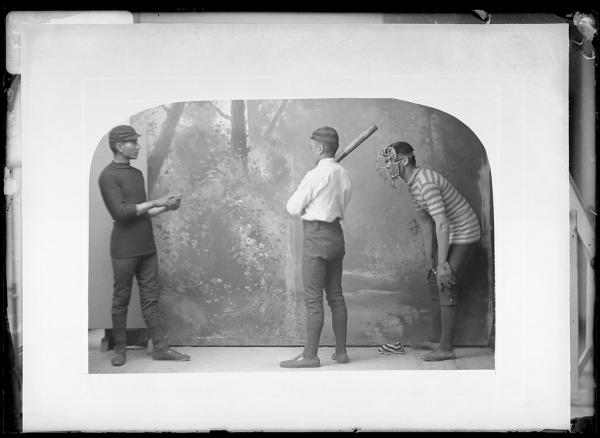 Three young men posed for playing baseball, c.1887