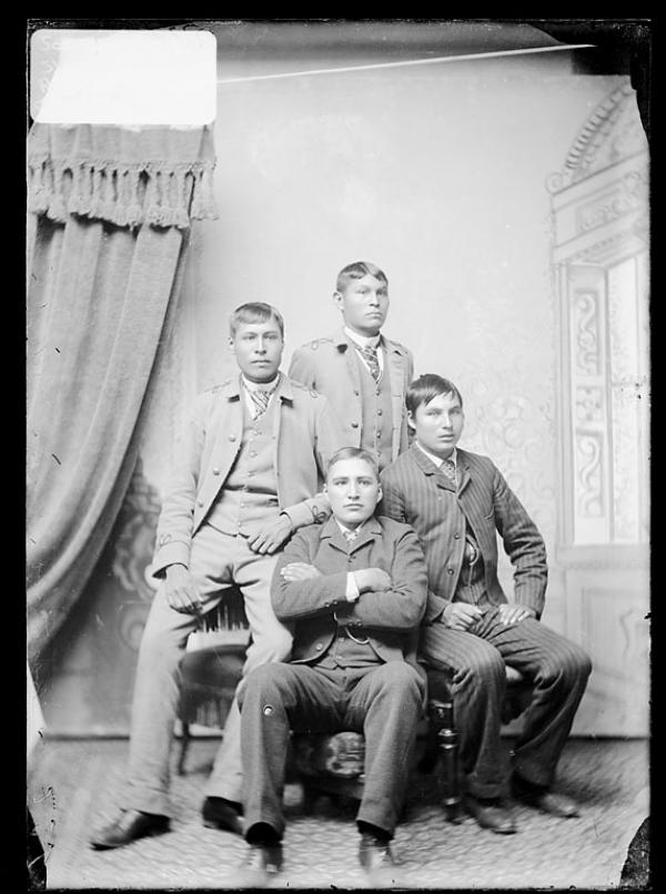 James Grant, Richard Sanderville, William Ellis and an unidentified young man, c.1890