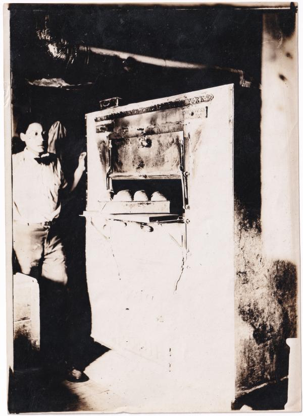 James B. Driver with bread oven, c.1910