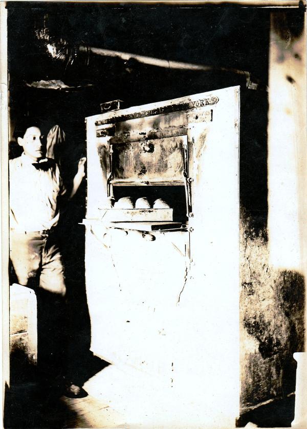 James B. Driver with bread oven, c.1910