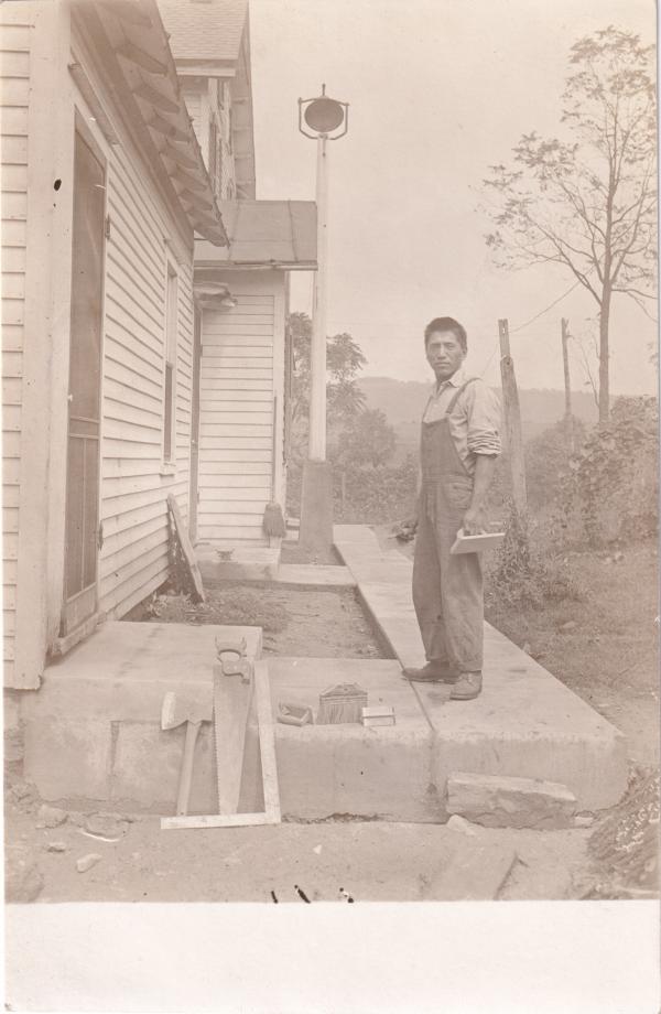 Harry John laying cement, #1, c.1914