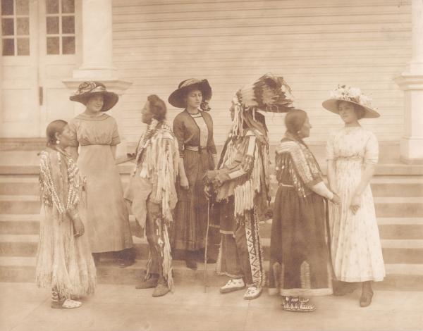 Jeanette Pappin, Clemence Le Traille and Blanche Jollie with Blackfeet Indian Visitors [version 2], 1913