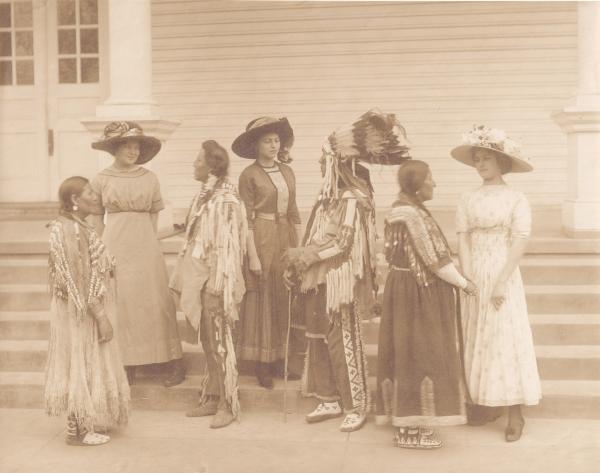 Jeanette Pappin, Clemence Le Traille and Blanche Jollie with Blackfeet Indian Visitors [version 3], 1913