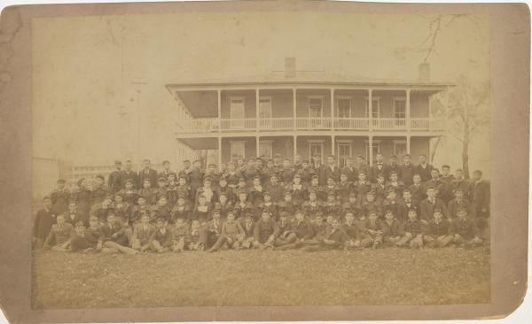 Students and Teachers Posed Next to Administration Building, c. 1895