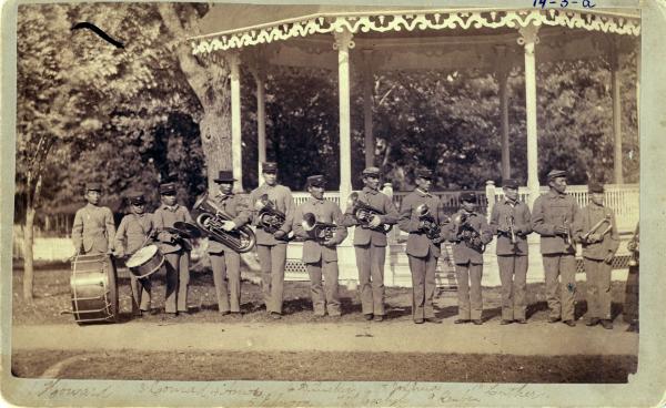 School band with Mrs. Baker [version 2], 1881
