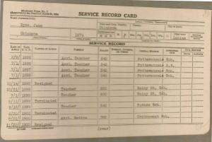 white index card with table of typed information
