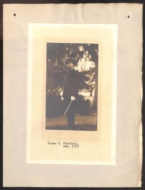 Personnel Folder and Service Record Card of James Riley Wheelock photograph pasted on piece of paper, depicts a man in uniform with white gloves and baton