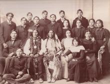 Two Cheyenne chiefs with a large group of students [version 1], 1898