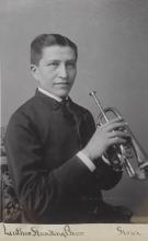 Luther Standing Bear with cornet [version 2], c.1883