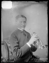 Luther Standing Bear with cornet [version 1], c.1883