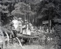 School Staff on Log Bridge at Camp Sells, c. 1913