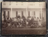 Apache Prisoners of War Upon Arrival Posed in Front of a Building, 1886