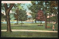 a colored view of the band stand and paths around it, a young woman stands in the foreground to the right, in the background is a big blue patch as if the maker added a pond in post-production