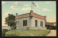 colored view of the Leupp Art studio, a flag and flag pole is painted above the roof, the laundry building is visible in the background to the right
