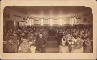 Christmas dinner in dining hall, 1885