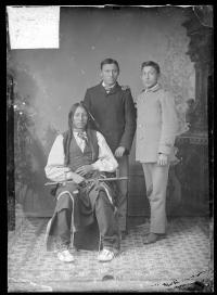 Young Bull Bear, a visiting chief, with Oscar Bull Bear, and Richard Davis, 1879