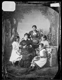 Mary Ealy, Nellie Carey, Mary Perry, and Jennie Hammaker with teacher Mary Hyde [version 1], c.1881