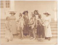 Jeanette Pappin, Clemence Le Traille and Blanche Jollie with Blackfeet Indian Visitors [version 1], 1913