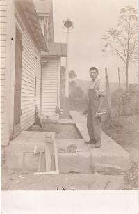 Harry John laying cement, #1, c.1914