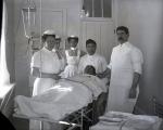Surgical Nurse Training in School Hospital [pose 1], c. 1908