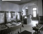 Female Students Seated at Desks in Sewing Room, c. 1910